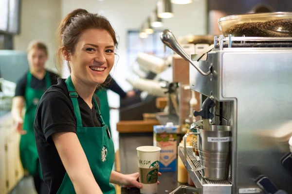 depositphotos_124868614-stock-photo-worker-at-starbucks-cafe